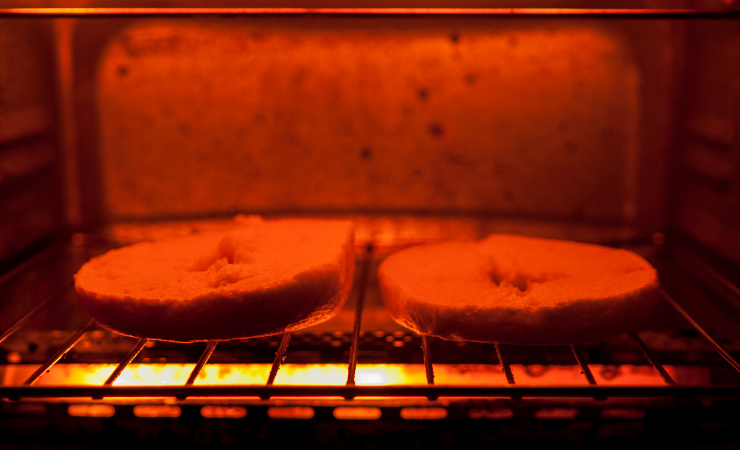 The oven heats up to 400 degrees F, so you need to use aluminum foil with caution when cooking